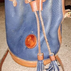 Dooney & Bourke Navy Leather Drawstring Bucket Bag with Tan Trim